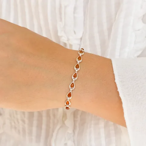 cognac färgad bärnsten armband i silver